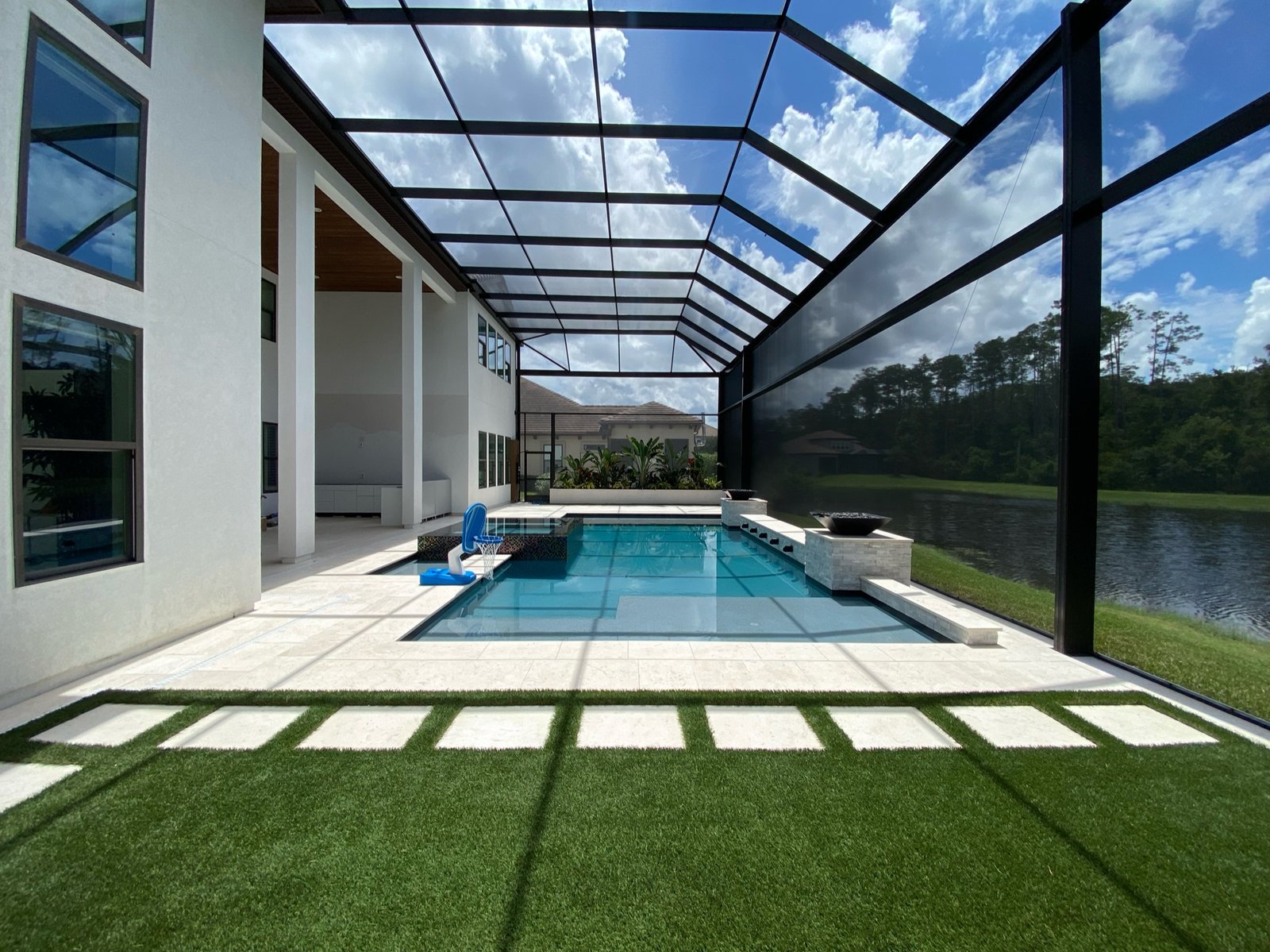 Modern pool screen enclosure installation in Palm Coast, FL